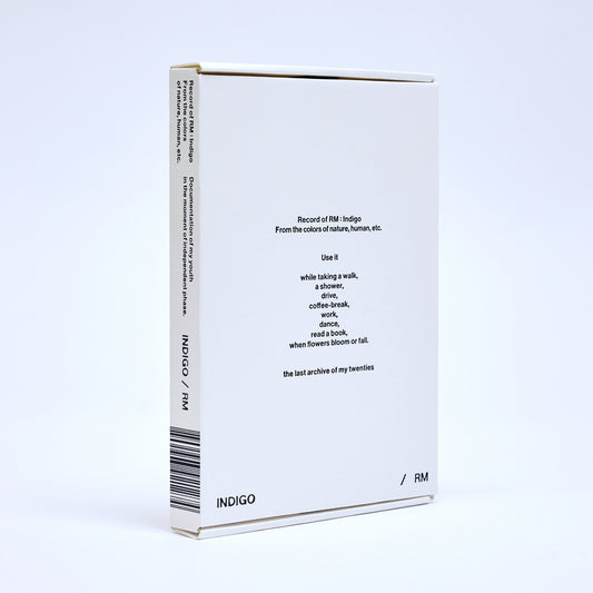 White book edition of RM’s “Indigo” with barcode and text details.