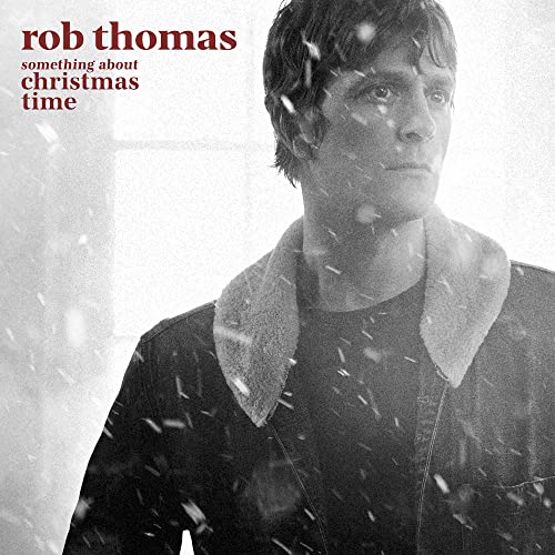 Black and white album cover featuring Rob Thomas with falling snow.
