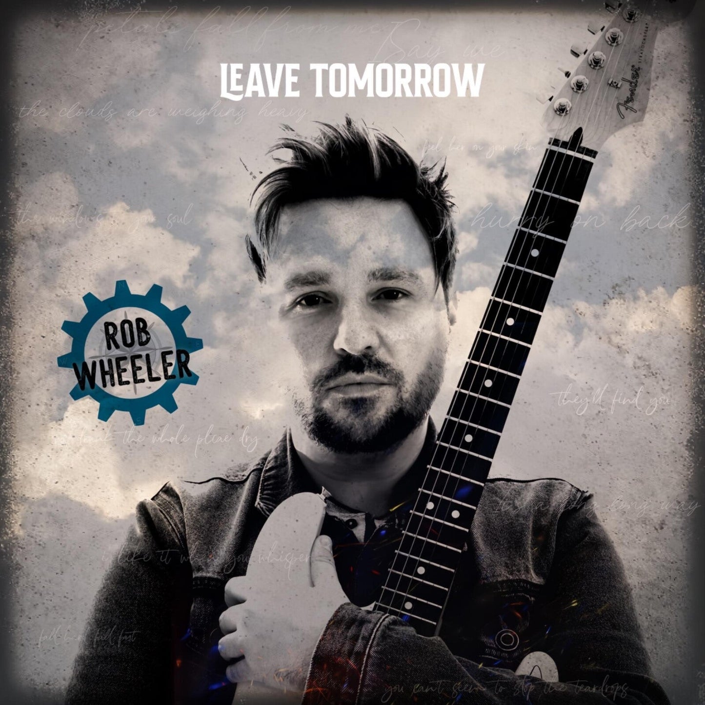 CD cover for Rob Wheeler’s “Leave Tomorrow,” featuring a man with a guitar.