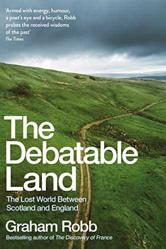 Book cover: green rolling hills, dirt road, and white title text.