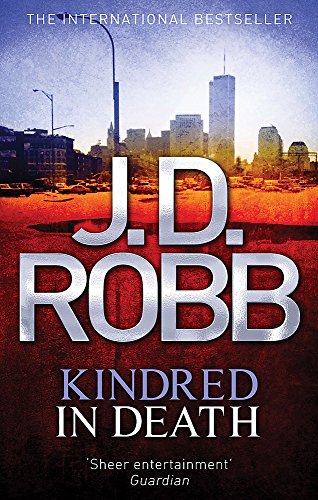 Book cover for "Kindred In Death" with city skyline and bold text.