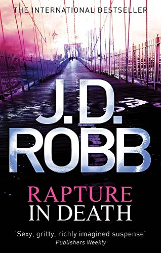 Book cover showing a suspension bridge at sunset with title Rapture in Death by J.D. Robb.
