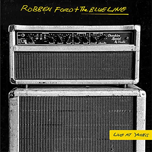 Black background with stacked guitar amplifiers and album title text.