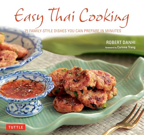 Cookbook cover featuring Thai fish cakes on a green leaf-shaped platter.