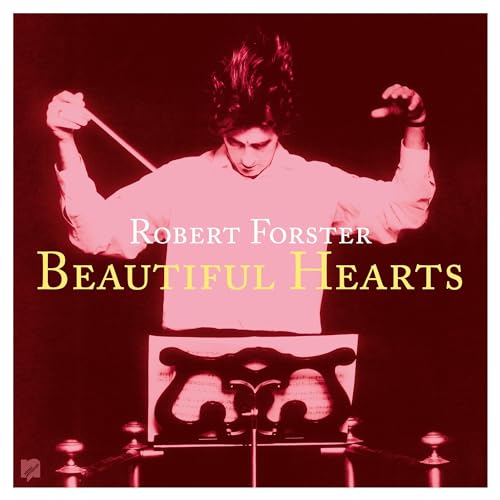 Robert Forster conducting an orchestra, with the album title Beautiful Hearts in yellow text.