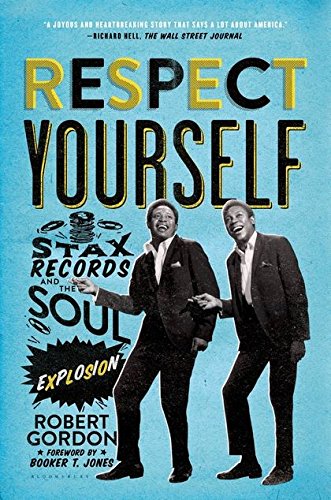 Book cover featuring two men in suits, title text, and a blue background.