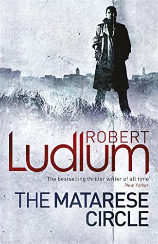 Book cover: man in coat stands before a blurred cityscape.