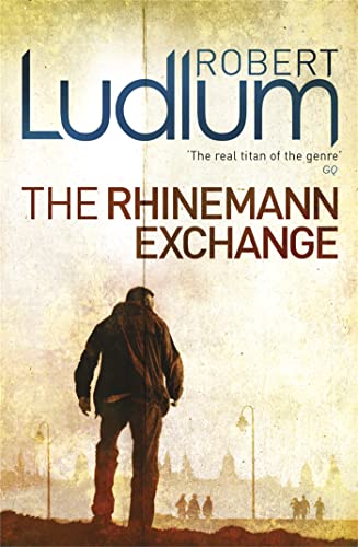 Book cover: man walking away from figures in a hazy landscape.