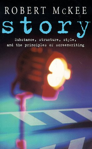 Book cover for Story by Robert McKee featuring a spotlight and film clapperboard.