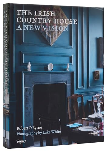 Book cover featuring a dark blue room with a fireplace, dining table, and chairs.