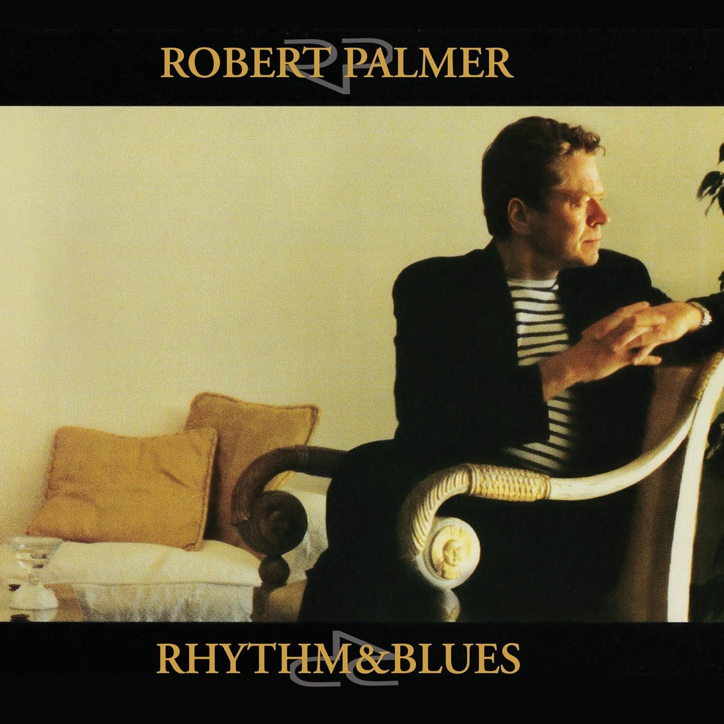 Robert Palmer album cover, "Rhythm & Blues", showing a man in a chair.