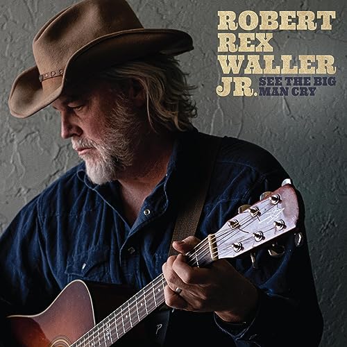 Man with cowboy hat playing acoustic guitar, album cover.