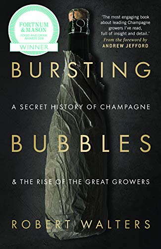 Book cover: "Bursting Bubbles" about Champagne, featuring a bottle in netting.