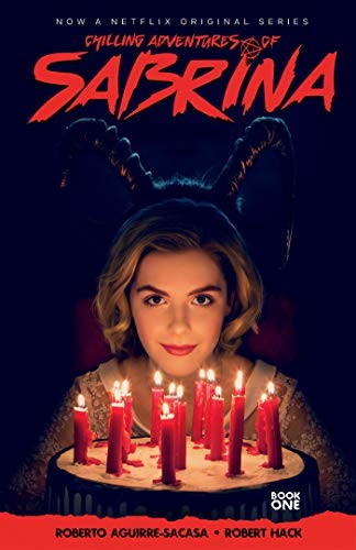 Sabrina with dark horns, surrounded by lit red candles on a cake.