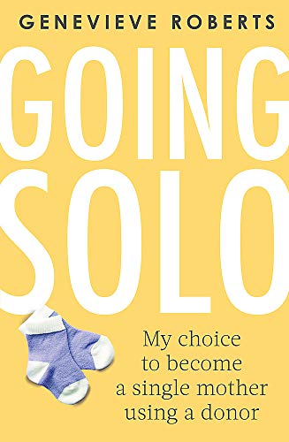 Book cover with large white text and a pair of baby socks.