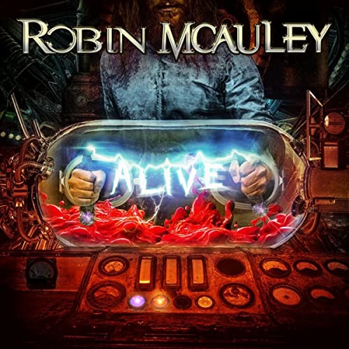 Album cover showing a man behind a glass chamber with electrical sparks and text.