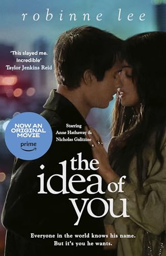 Book cover: couple embracing, city lights blurred in background.