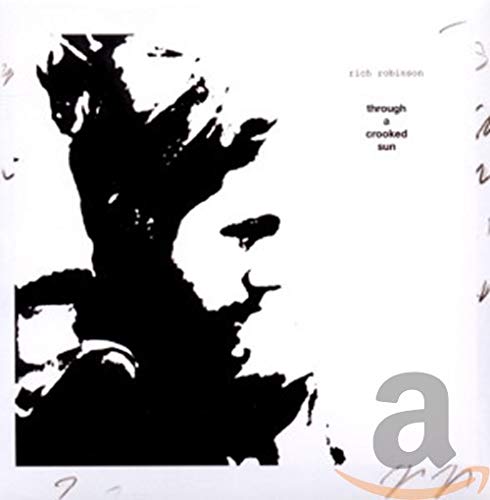 CD cover: black and white abstract face with album title.