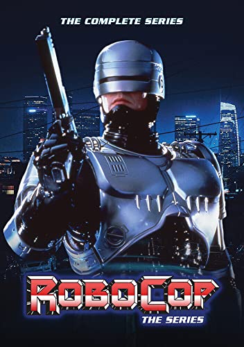 Robocop in silver armor holding a gun, city skyline background.