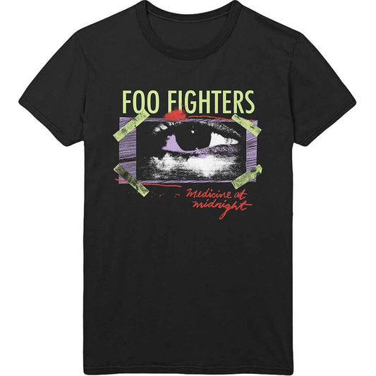 A man wearing a black Foo Fighters Medicine at Midnight t-shirt with eye graphic.