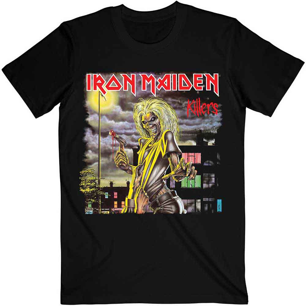 A man wearing a black Iron Maiden Killers graphic t-shirt with blue jeans.