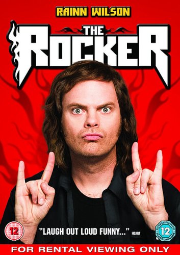 Rainn Wilson on The Rocker DVD cover making rock and roll hand gestures.