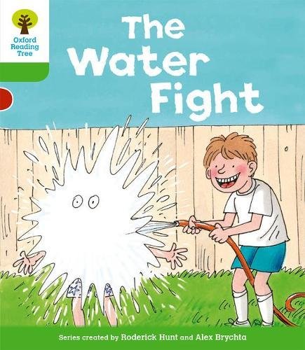 A boy sprays water from a hose at a splashing character in a garden.