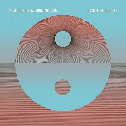 "Album cover with abstract red and blue circle design, artist and title displayed."
