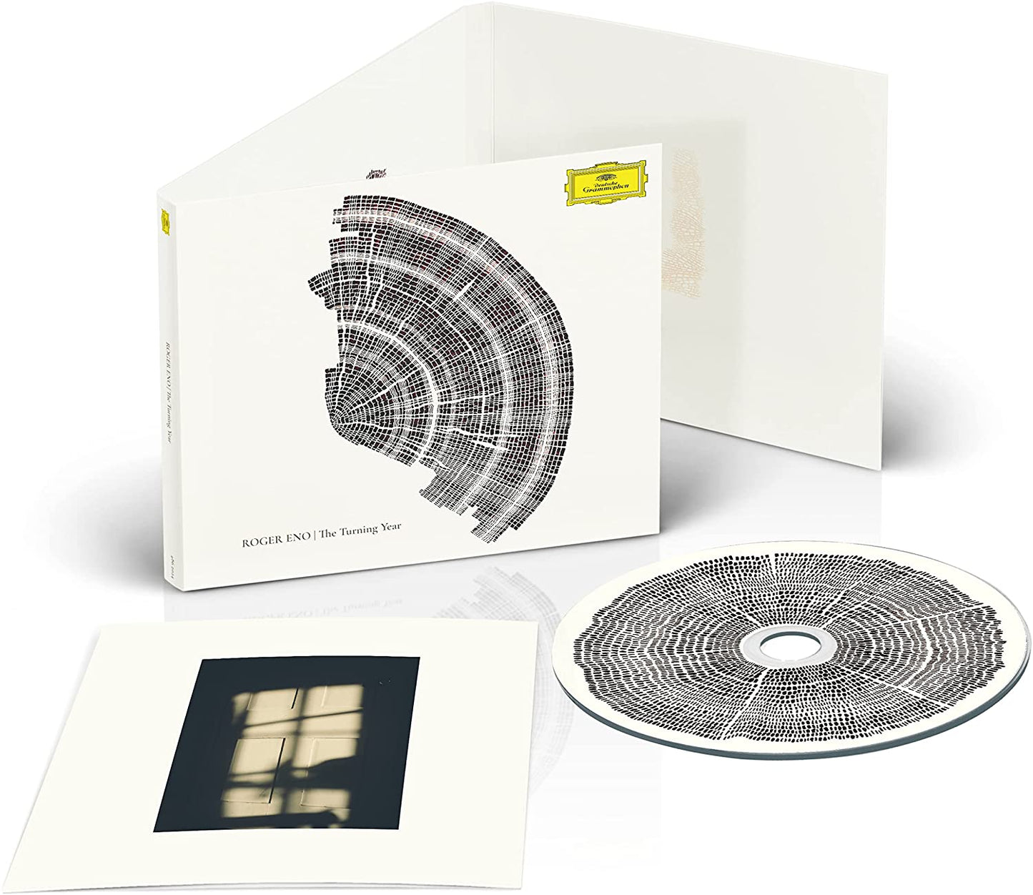 Roger Eno CD packaging with circular design and included booklet/insert.