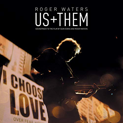 Roger Waters “Us + Them” vinyl cover with a silhouetted musician.