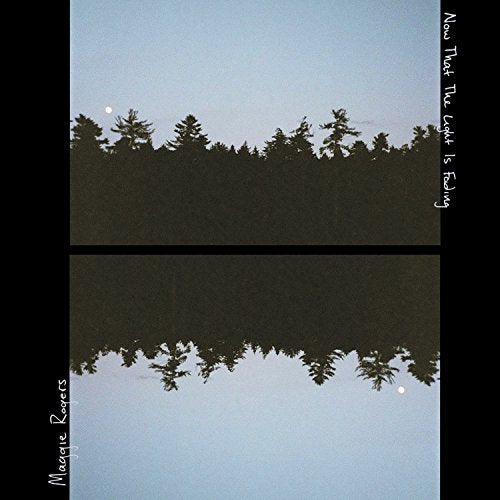 Vinyl album cover: silhouetted trees against a gradient blue sky.