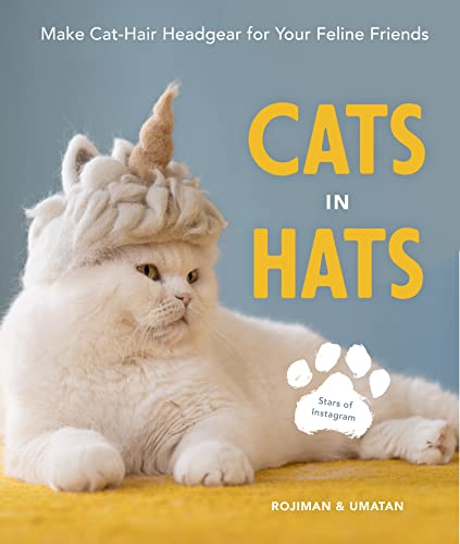 Book cover featuring a white cat wearing a fluffy unicorn horn hat.