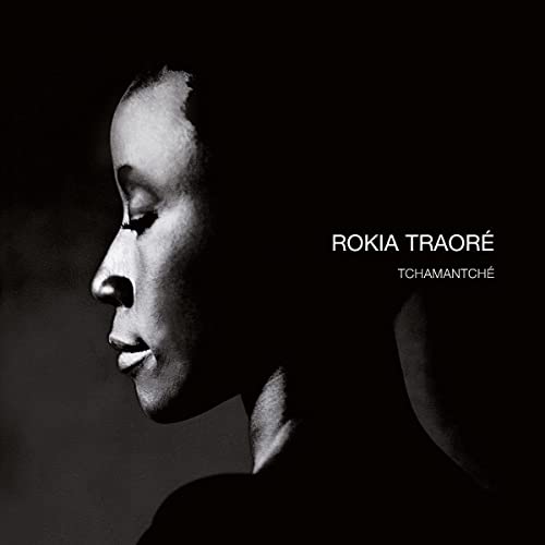 Black and white portrait of Rokia Traoré, album cover for Tchamantché.