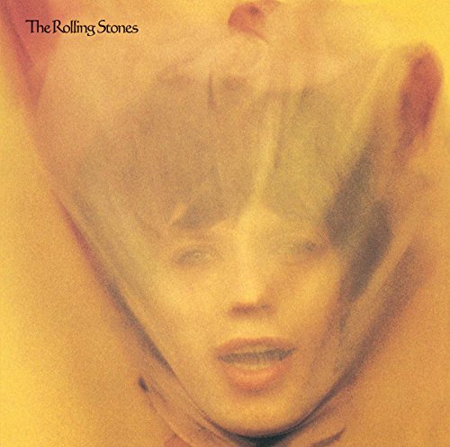 Blurred, golden-toned album cover featuring Mick Jagger’s face.