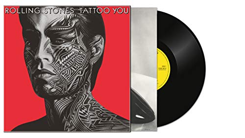 Rolling Stones “Tattoo You” vinyl record with illustrated cover art.