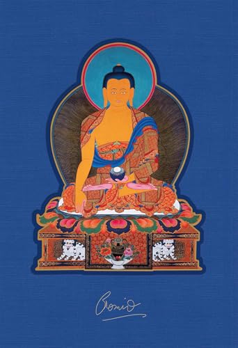 Golden Buddha figure with intricate robes, seated in a lotus position.