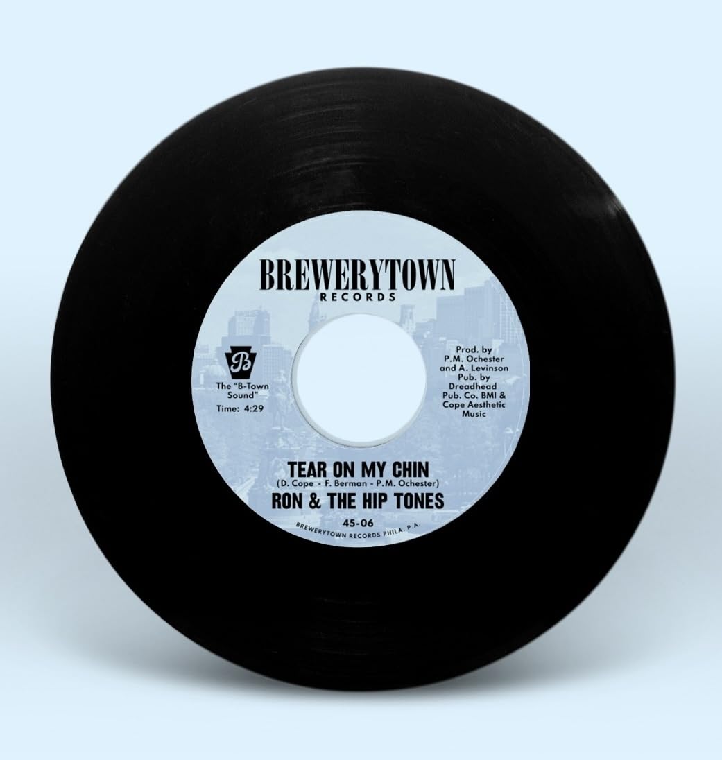 Black 7-inch vinyl record with white label, text, and brewery logo.