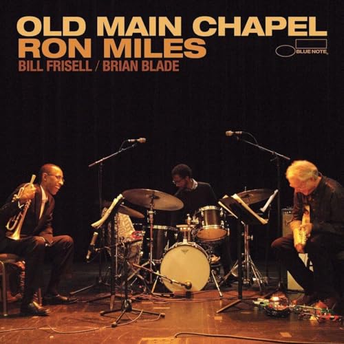 Jazz musicians performing on stage, album cover for Ron Miles’ “Old Main Chapel.”