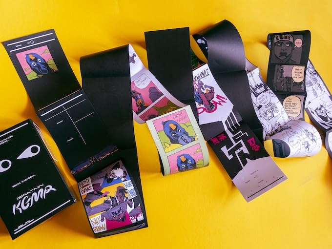 Gratuitous Ninja" comic book pages and packaging arranged on a yellow surface.