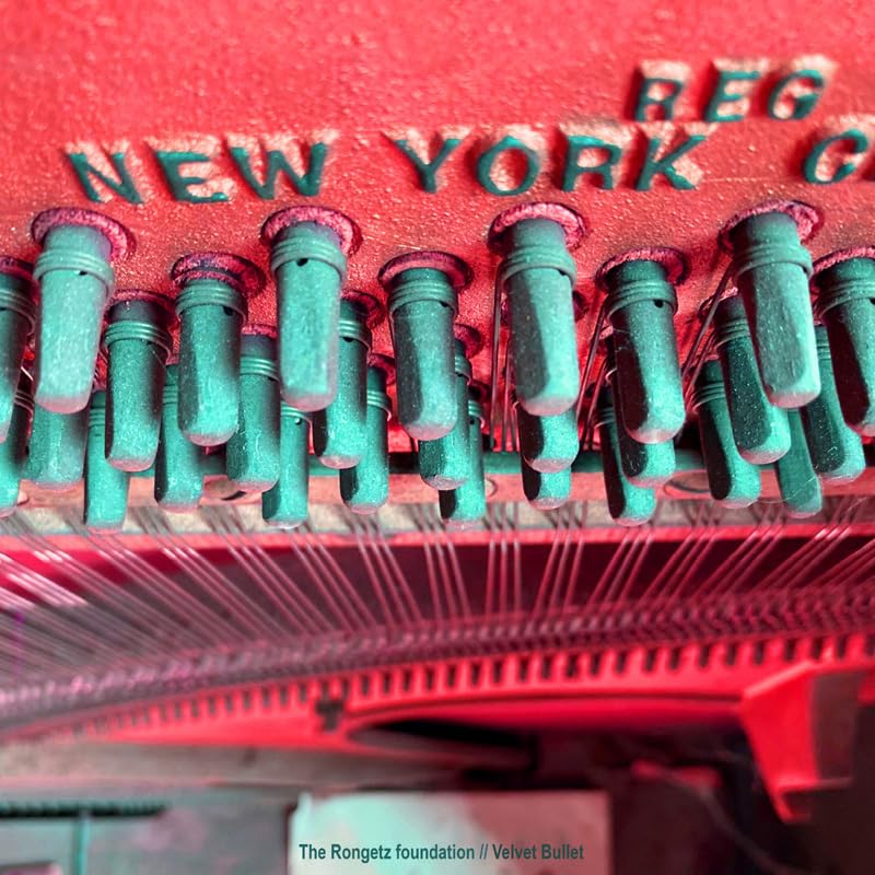 CD cover with a close-up of green stadium seats and red accents.