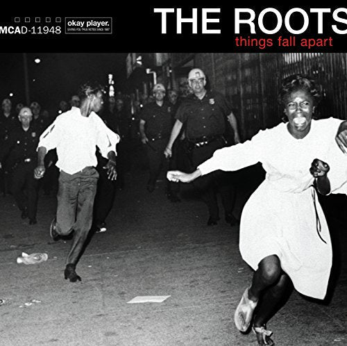 Black and white album cover for The Roots’ “Things Fall Apart” showing people running.