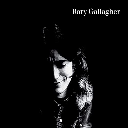 Black and white portrait of musician Rory Gallagher on album cover.