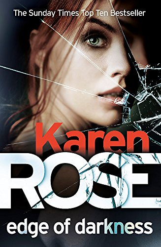 Book cover: woman’s face fractured by cracked glass, red title text.