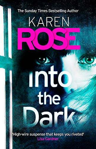 Book cover: woman’s face obscured, title “Into the Dark” in bold letters.