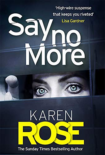 Book cover: "Say No More" by Karen Rose, featuring a woman’s watchful eyes.