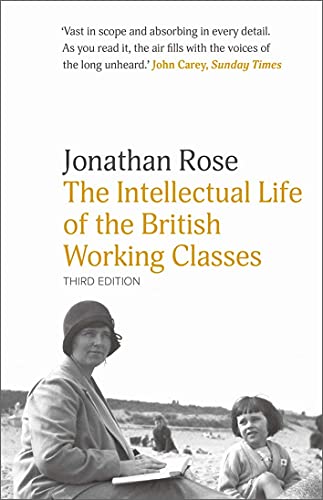 Book cover showing a woman reading to a child on a beach.