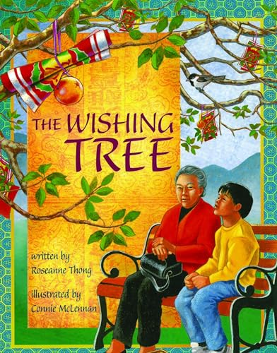 Book cover: grandmother and grandson sit under a decorated tree.