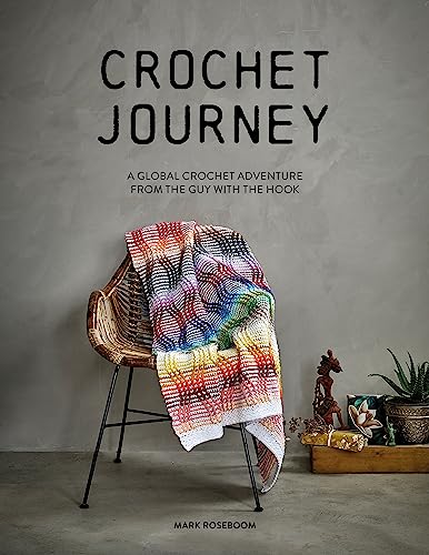 Book cover with colorful crocheted blanket draped over a wicker chair.