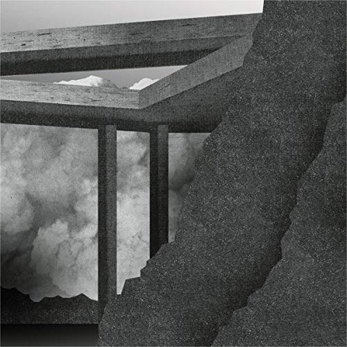 The image depicts a dark, monochromatic scene with a wooden structure and cloudy sky. Here is a concise, descriptive alt text: "Dark wooden platform with cloudy sky and mountains in the background."