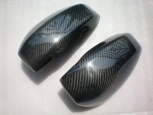 Two glossy, black carbon fiber car side mirror covers.